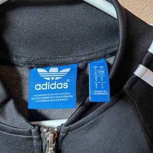 Adidas like new without tags size small zip up warm-up jacket
